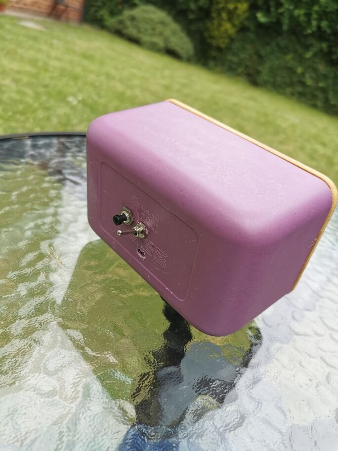 A photo showing the drilled out MicroUSB hole, which didn't turn out very well, not being the right shape.